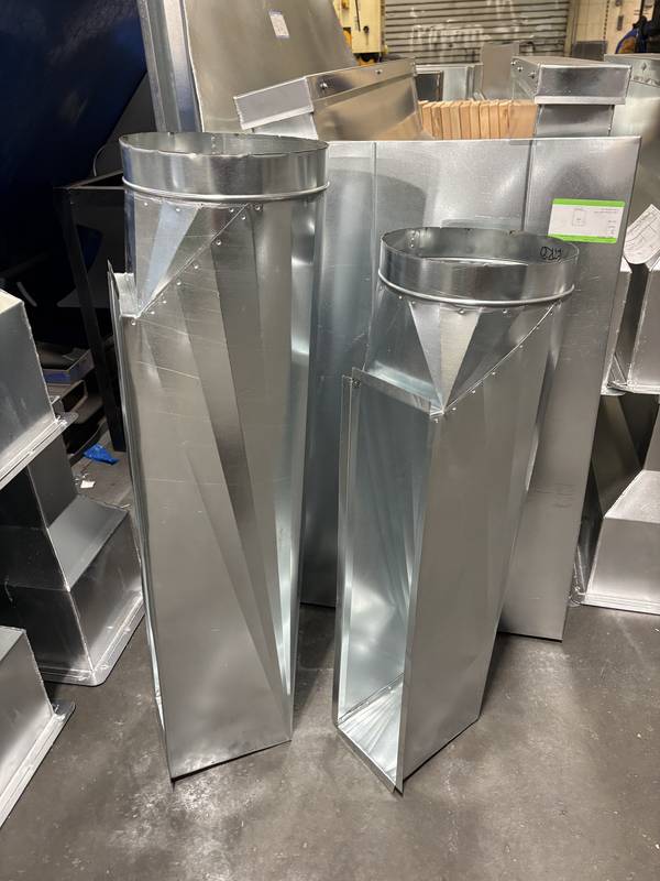 Rectangular-to-round transition pieces