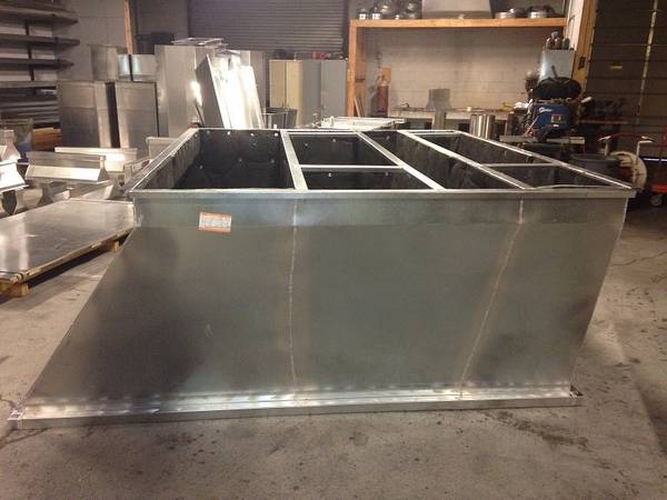 Large adaptor curb with tapered sides