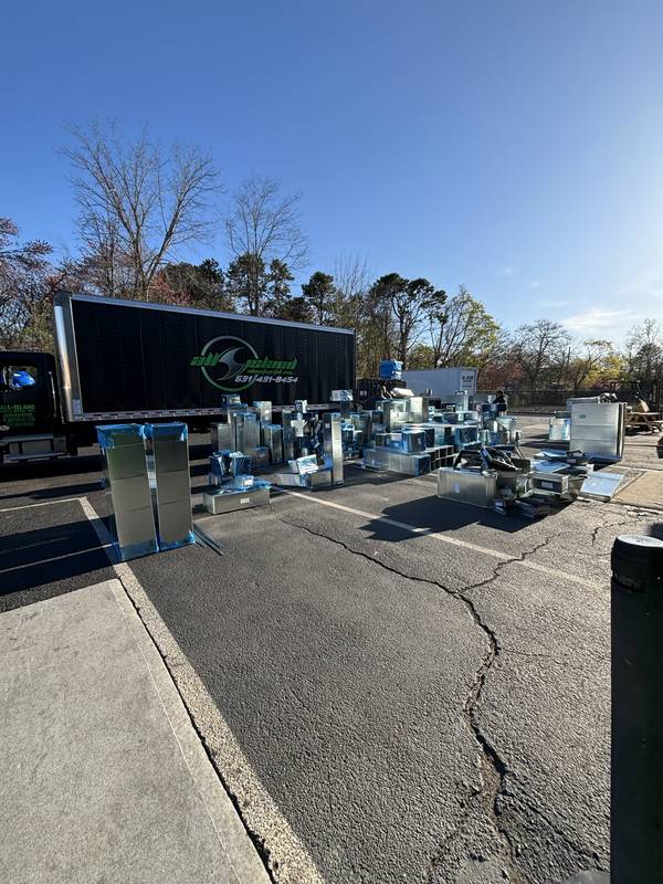 Delivery truck loaded with duct work