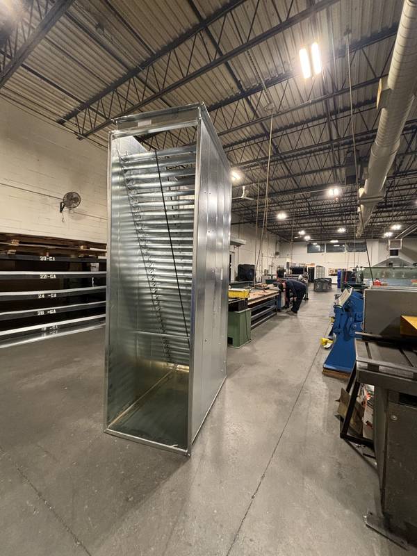 Rectangular duct with turning vanes