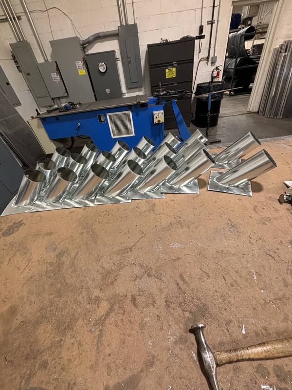 Custom pipe portals and wall boots