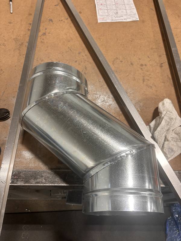 Round duct offset fitting