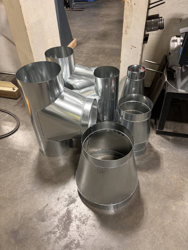 Round duct tees and reducers