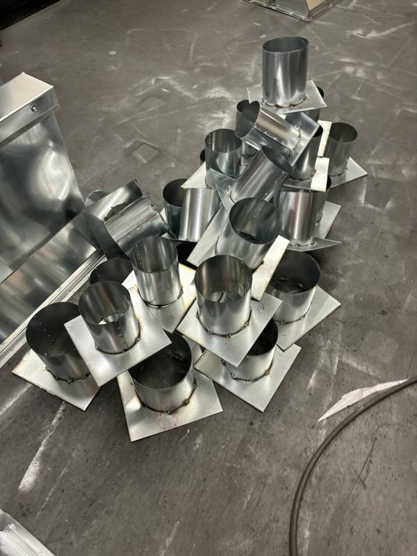 Round pipe portals with flange plates