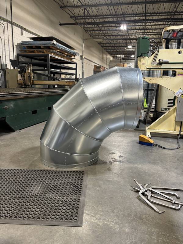 Large spiral duct elbow